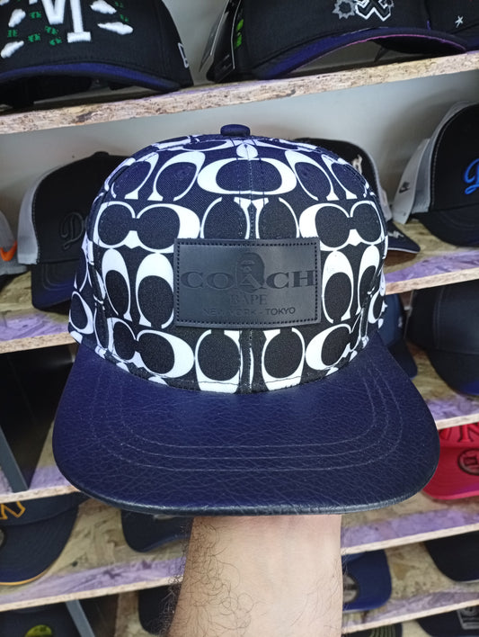 BK COACH NEGRA CON BLANCO PLANA
